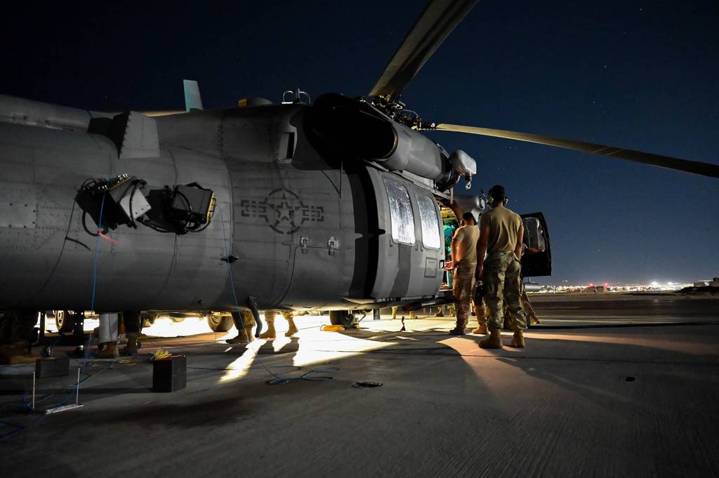 Airmen from the 87th Electronic Warfare Squadron assess the electronic warfare sensors of an HH-60G Pave Hawk during Red Flag 23-3 at Nellis Air Force Base, Nevada, in 2023.